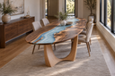 Slim oval walnut resin table in a narrow dining room