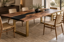 Walnut black resin table with woven dining chairs
