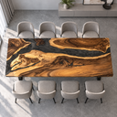 Overhead horizontal view of a walnut and black epoxy resin dining tabletop with swirling grain
