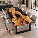 Olive wood and black epoxy resin dining tabletop showing branching grain and irregular wood contours