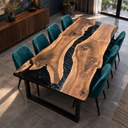 Elevated angled view of a black walnut dining table with a winding black epoxy resin river