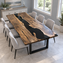 Angled view of a black walnut dining table with flowing dark grain and a glossy black epoxy resin river