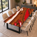 Angled view of a walnut dining table with contrasting red and white epoxy resin channels