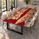 Angled view of natural walnut sections within a ruby red epoxy resin dining tabletop