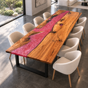 Angled view of golden olive wood grain and swirling pink epoxy resin on a dining table