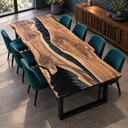 Opposite angled view of a black walnut epoxy resin dining table with teal chairs