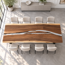 Overhead horizontal view of walnut grain and a slender wood island within clear epoxy resin