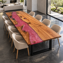 Corner view of an olive wood dining table with flowing pink epoxy resin and natural knots