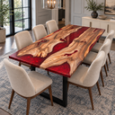 Corner view of a walnut and red epoxy resin dining table with cream upholstered chairs