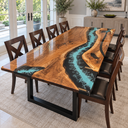 Corner view of a glossy walnut dining tabletop with a blue and black epoxy resin river