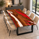Corner view of a walnut dining tabletop with red resin pools and a white resin channel
