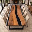 Elevated end view of a black walnut dining table with a gently curving black resin river