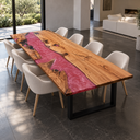 Wide angled view of an olive wood and pink epoxy resin dining table with cream chairs