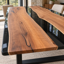 Close-up of black walnut grain, a rounded tabletop corner and reflective black epoxy resin