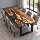Opposite corner view of a walnut and black epoxy resin dining table with gray chairs