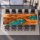 Overhead side view of a walnut conference table showing two turquoise epoxy resin inlays and flowing wood grain