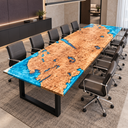 Elevated diagonal view of a poplar epoxy resin conference table with blue resin surrounding irregular golden wood contours