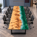Front end view of a poplar conference table with golden wood and a glossy green epoxy resin shoreline