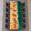 Overhead lengthwise view of a rectangular poplar conference table with green epoxy resin along one long edge