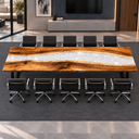 Elevated long-side view of a walnut conference table with a white epoxy resin center beneath a wall-mounted screen