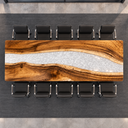 Overhead side view of a rectangular walnut conference tabletop showing a wide white resin river and flowing grain