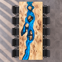 Top-down view of the poplar conference table with branching blue resin and golden wood islands