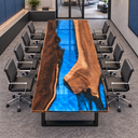 Elevated end view of the blue resin walnut conference table surrounded by black office chairs
